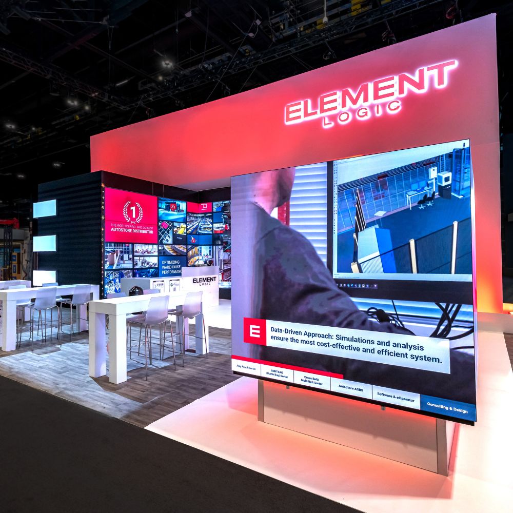 Exhibit Concepts award-winning modular exhibits at EXHIBITORLIVE 2025 and ProMat 2025, featuring immersive in-line timeline display and interactive rental booth with AR warehouse experience.