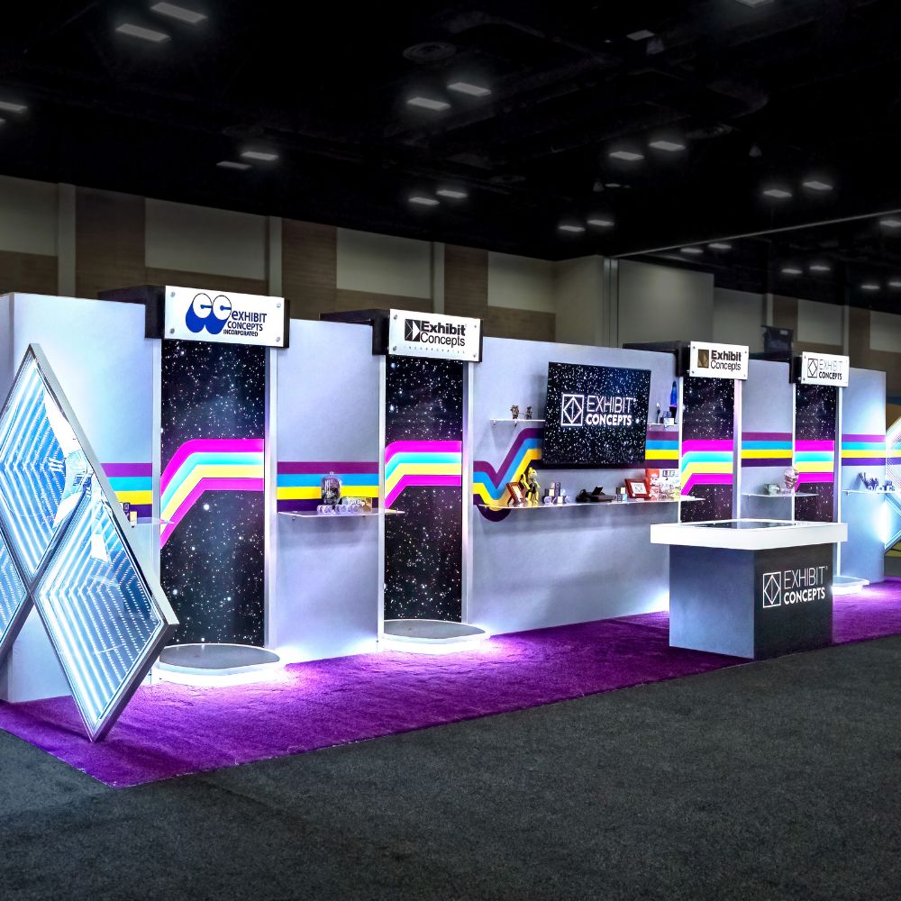 Exhibit Concepts award-winning modular exhibits at EXHIBITORLIVE 2025 and ProMat 2025, featuring immersive in-line timeline display and interactive rental booth with AR warehouse experience.
